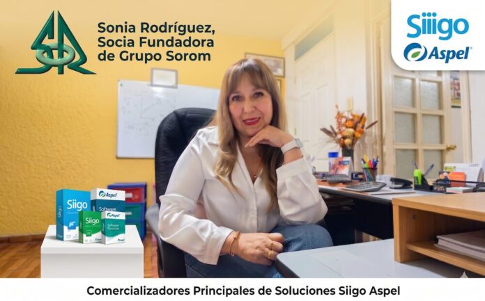 Gráfico publicitario digital institucional en tonos amarillos y blancos de la empresa comercializadora Grupo Sorom. En el centro aparece Sonia Rodríguez, Socia Fundadora de la compañía, sentada frente a su escritorio con una blusa blanca de satén; en la esquina superior izquierda se ubica el imagotipo verde de 