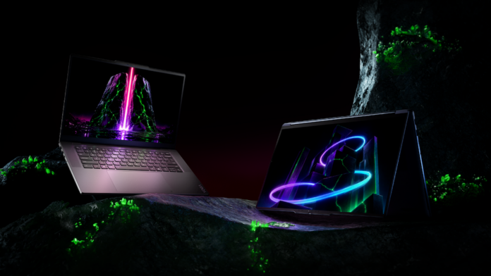 Composición fotográfica conceptual de dos laptops Lenovo Yoga colocadas sobre superficies rocosas iluminadas por cristales verdes en un fondo oscuro; la laptop de la izquierda se muestra abierta con teclado iluminado y la de la derecha en modo carpa mostrando gráficos bioluminiscentes.